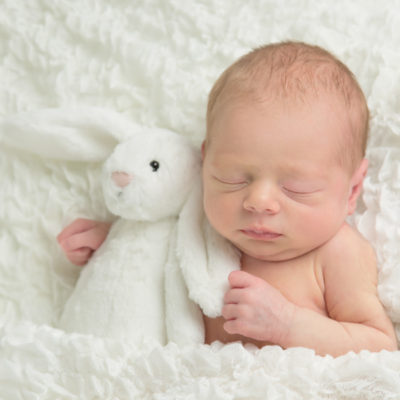 newborn with teddy