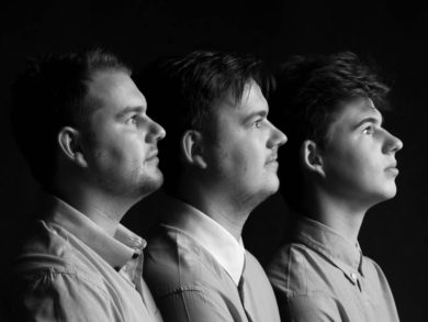 Three male siblings profile head shot