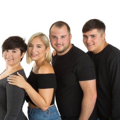 Male & female siblings on white background