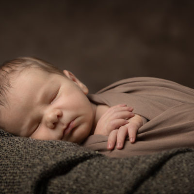 Newborn baby swaddled