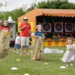 Children taking part in sack race
