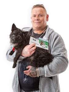 Ted with voucher and owner Kevin