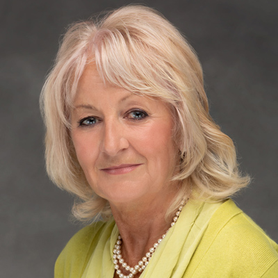 Mature female headshot in colour